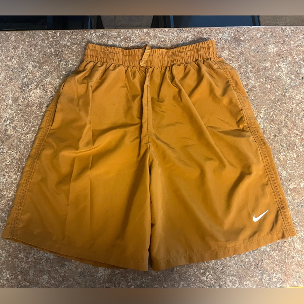 Nike Mustard Brown Athletic Shorts with White Swoosh